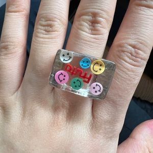 Smile faces Transparent ring
Size 7